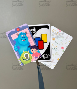 Monsters Inc , Uno Wild Draw 4, Floral (white background)