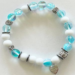 7" - Blue mermaid, snow jade, and hematite with base metal spacers