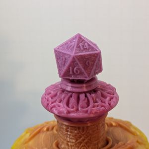 A close-up of the d20 stopper, showing the numbers.