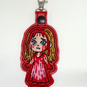 Carrie (approx measures 4 1/8 x 2 inches)