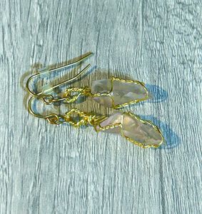 Earrings displayed side view.