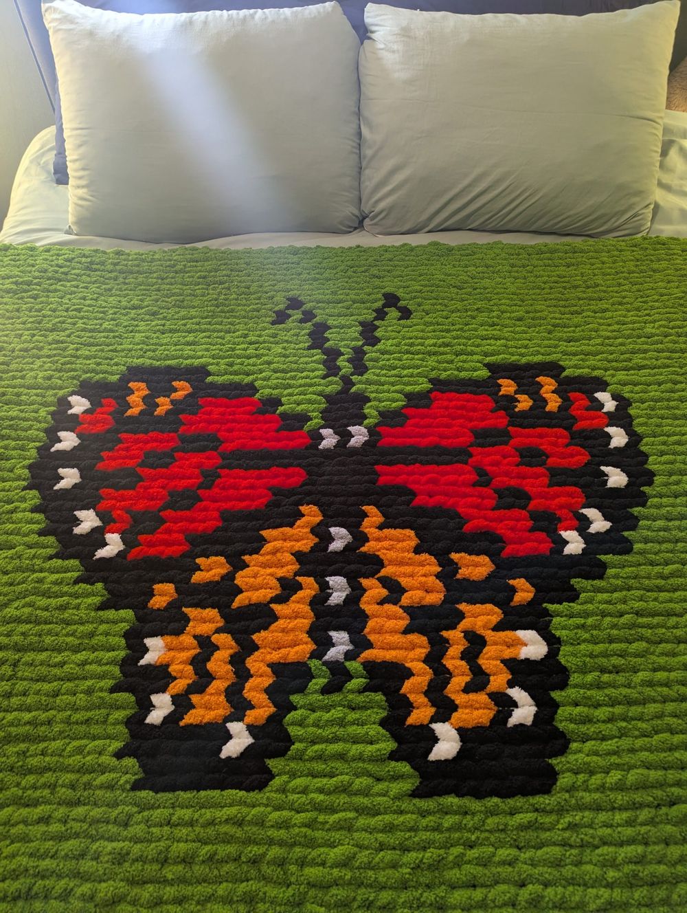 “Butterfly Bloom” Hand-Knit Blanket - A Flutter of Cozy Charm