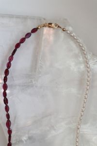 A closer look at the 14k gold-filled clasp on the Garnelle Necklace