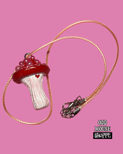 A zoomed out look of the mushroom necklace