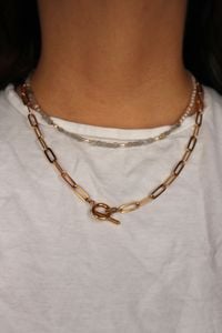 The Selene Necklace worn with a gold paperclip necklace.