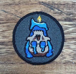 Blue Candle in Skull