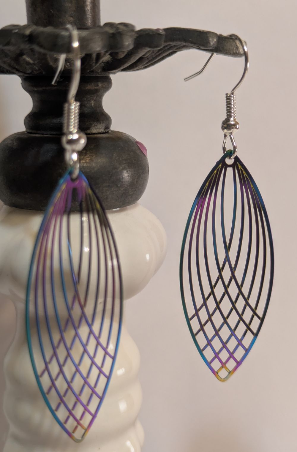 Anodized purple laser-cut dangly earrings