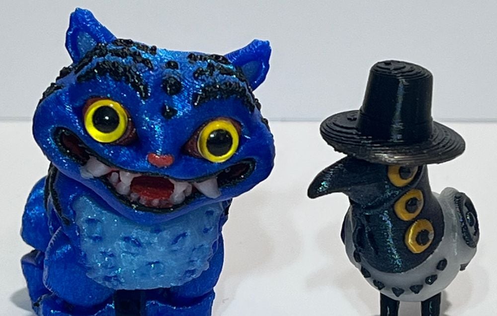 Derp Tiger and Suss Bird Figurines