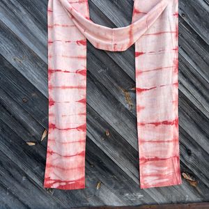 Red Madder Halved scarf hanging from a wall