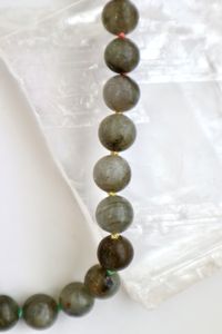 Closer look at the multicolor ombre silk knotting on the Prism Necklace from Auréad Designs