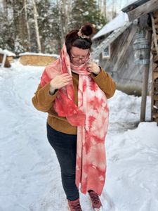 Me putting on the Red Madder Feather scarf