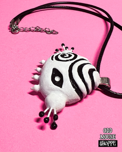 The other side of a necklace to show its not flat or premade
