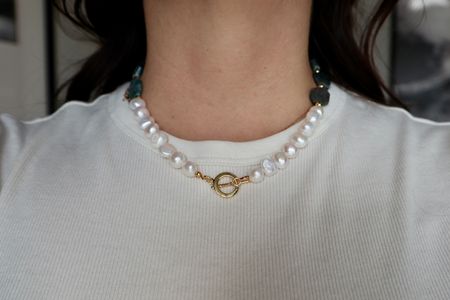 Azurea Necklace worn with the freshwater pearls and gold filled toggle clasp in front.