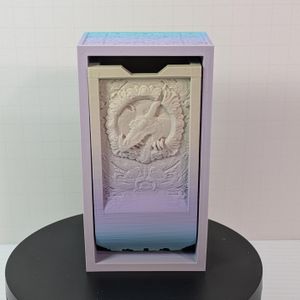 A rectangular 3d printed dice tower. This shows how the vertical piece folds into the horizontal piece, making it a dice box.