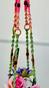 Pink/green. Tiger eye