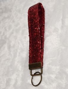 Red - Sequin like texture. Looks like Dorothy's shoes!