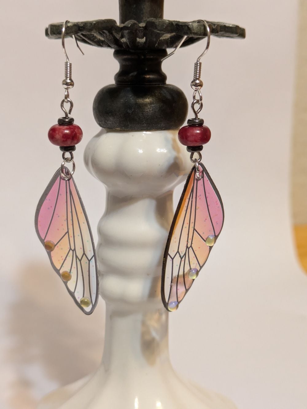 Red long resin butterfly wings with natural glass bead accents