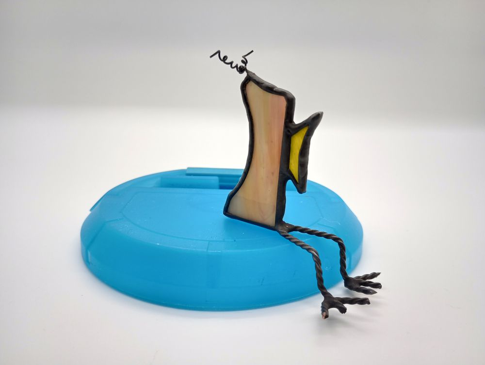 Mystery Stained Glass Bird in Paper Egg