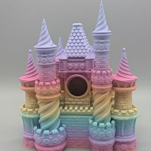 The back of the dice tower, showing the hole you drop the dice into. It's between the two taller spires, in the back of a tower.