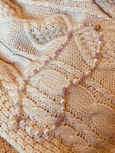 The Lavender Disco Pearl necklace in sunlight
