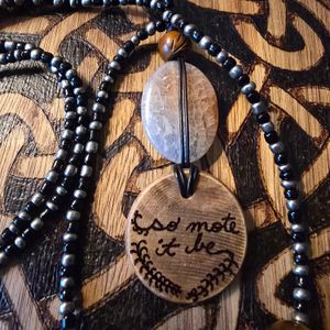 Close-up of necklace's back view.