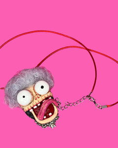 A front side view of the sculpted pendant