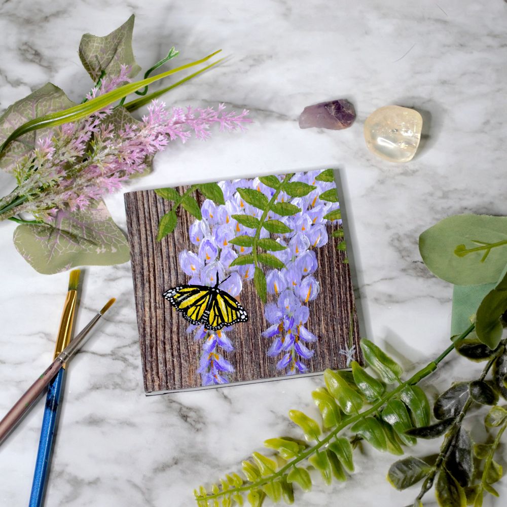 Yellow Monarch Butterfly on Wisteria Flowers