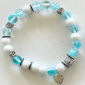 7" - Blue mermaid, snow jade, and hematite with base metal spacers