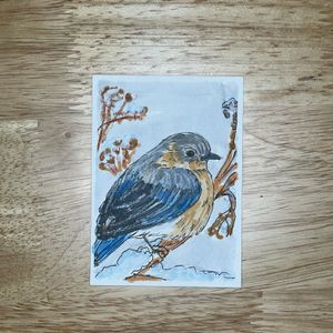 ACEO Bluebird painting shown on flat surface