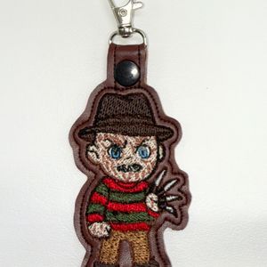 Nightmare Slasher (approx measures 4 1/8 x 2 1/8 inches)