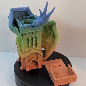 The wyvern dice tower with the tray sitting beside it, showing how the two pieces separate. 