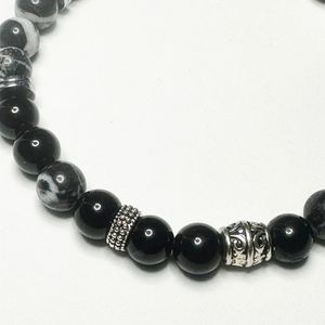 8", ebony blackwood, zebra jasper, and hematite with base metal spacers