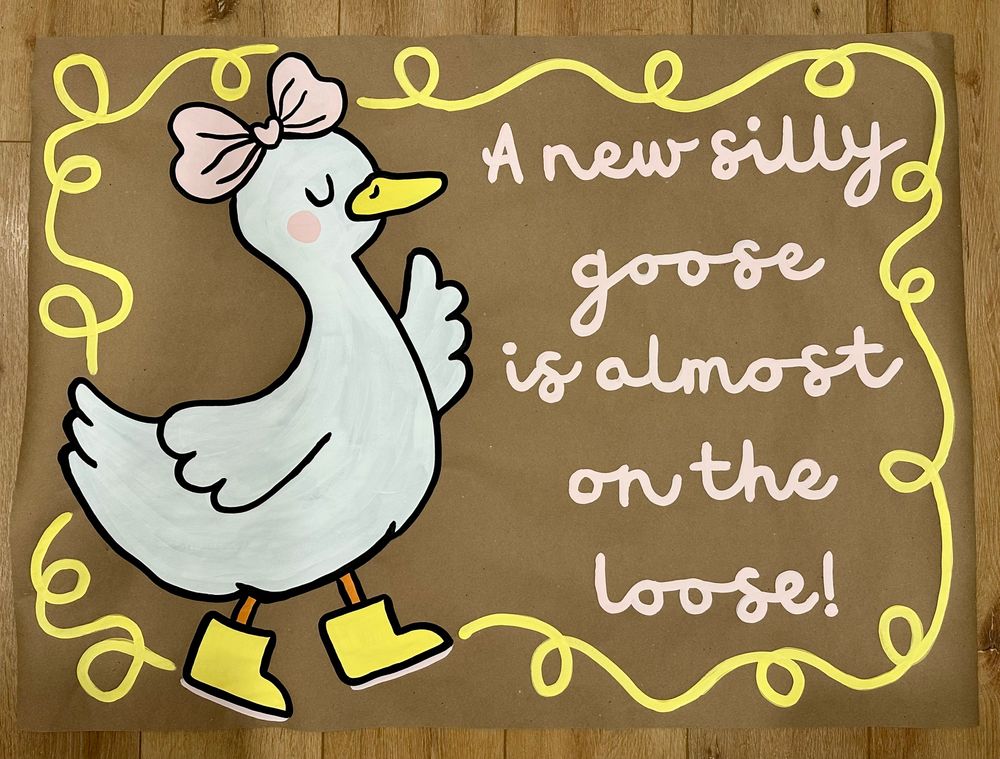 A new silly goose is almost on the loose baby shower banner with a cartoon painting of a goose wearing boots.