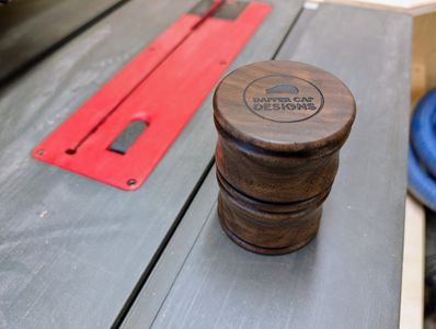 An example of the maker's mark on the bottom of a dice cup (note: profile may be different than that of current listing)