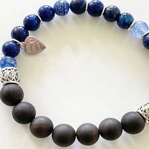 8" - Ebony blackwood, indigo or red tigers eye, and blue lapis lazuli with base metal spacers