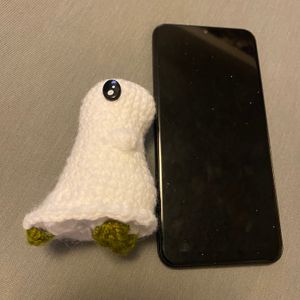 Ghostie boi next to phone right side