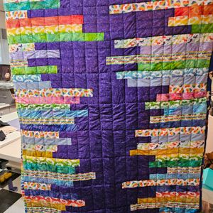 Type It quilt in pride theme