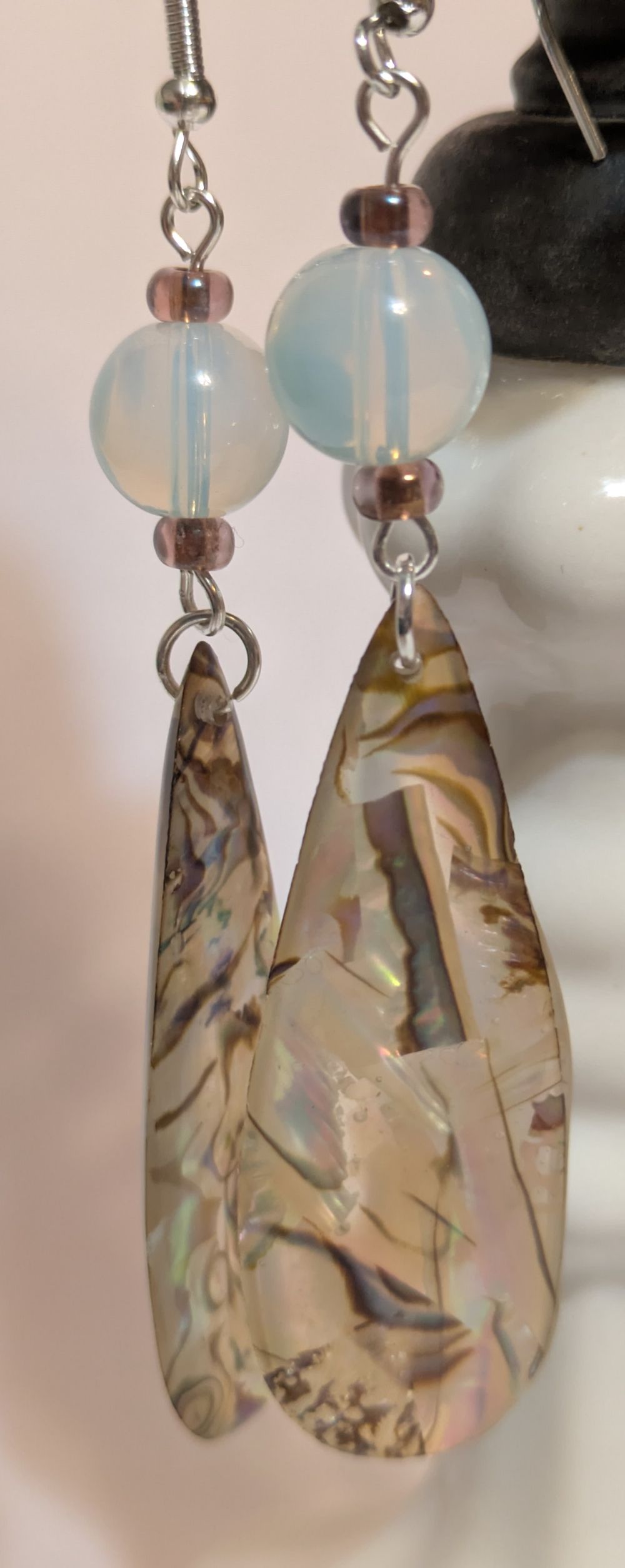 Tea gray opalescent-finished dangling resin earrings with bead accents