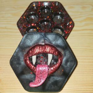 Clay mouth and teeth detail on hexagonal box 