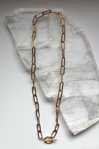 The Catenne Necklace finished with a PVD gold stainless steel toggle clasp