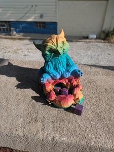 Just a rainbow color baby owlbear, taking in some morning sun.