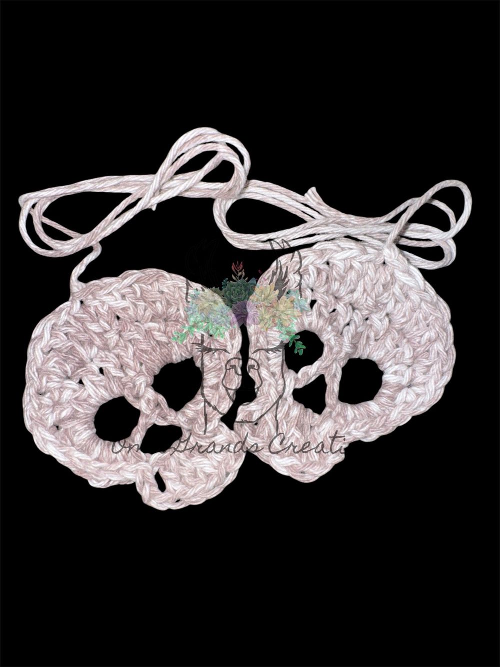 A Pair of Crocheted Skulls— Marbled