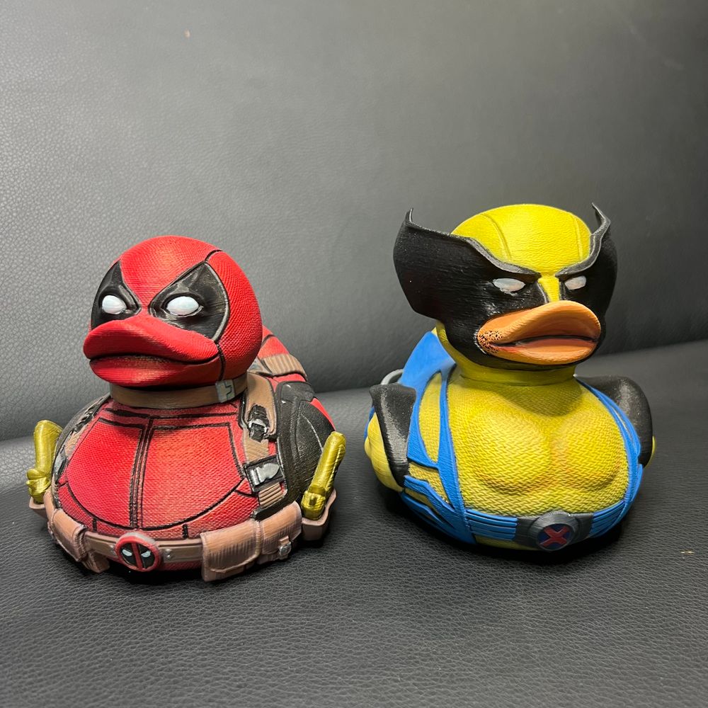 Deadpool and Wolverine ducks hand painted