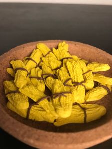 A pile of resources displayed in a bowl and ready for gameplay. A bowl will not be included in your purchase.