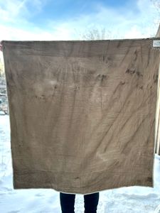 The beautiful brown backing of the Honey Bee Quilt, 100% cotton and dyed with Black Walnut hulls 