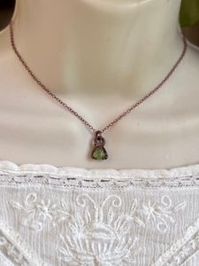 Small, dainty raw peridot copper electroformed pendant on 14” chain