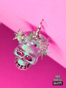 An earring looking forward with a top view looking down
