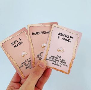 A standard, playing-card size deck, available in Pink Pearl, Grotto Green, or Priestess Purple