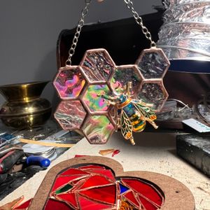 Iridescent Honeycomb with Bee
