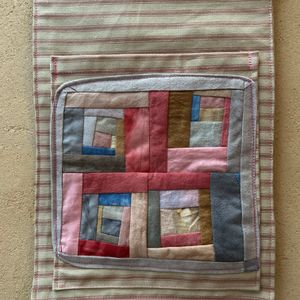 Close up of bottom pocket patchwork 